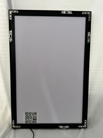 Back view of slim frame RGB LED acrylic lightbox showing mounting hardware and power cord setup, ready for wall installation, Snapping Turtle Gallery.