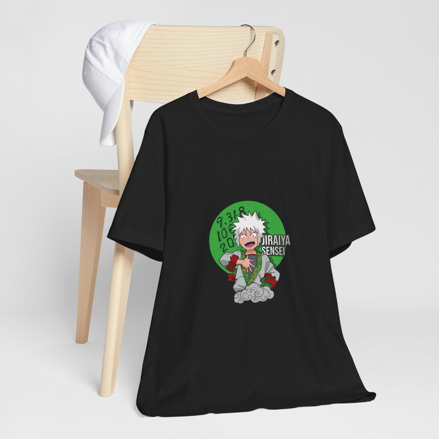 Alt: Toad Sage Sensei Anime Shirt on black, hanging on chair with cap, lifestyle display by Snapping Turtle Gallery