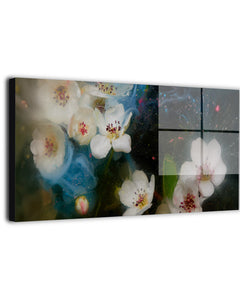 White blossoms suspended in water with swirling blue accents, canvas wall art print