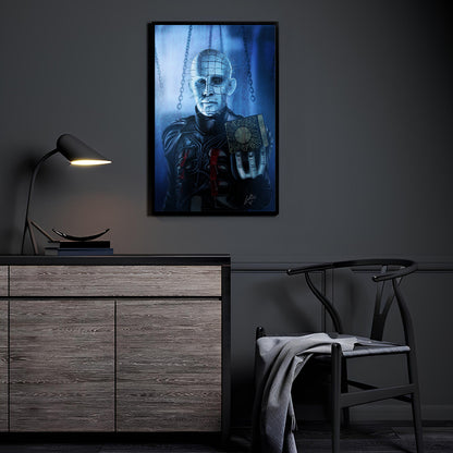 "Chains of Dread – Pinhead Wall Art on canvas, acrylic, and metal – Pinhead from Hellraiser with chains and iconic pin-covered face."

