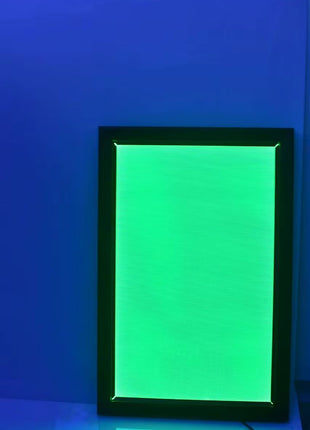 Rear view of a 16x24 RGB LED lightbox frame showing the Bluetooth app QR code label and mounting profile