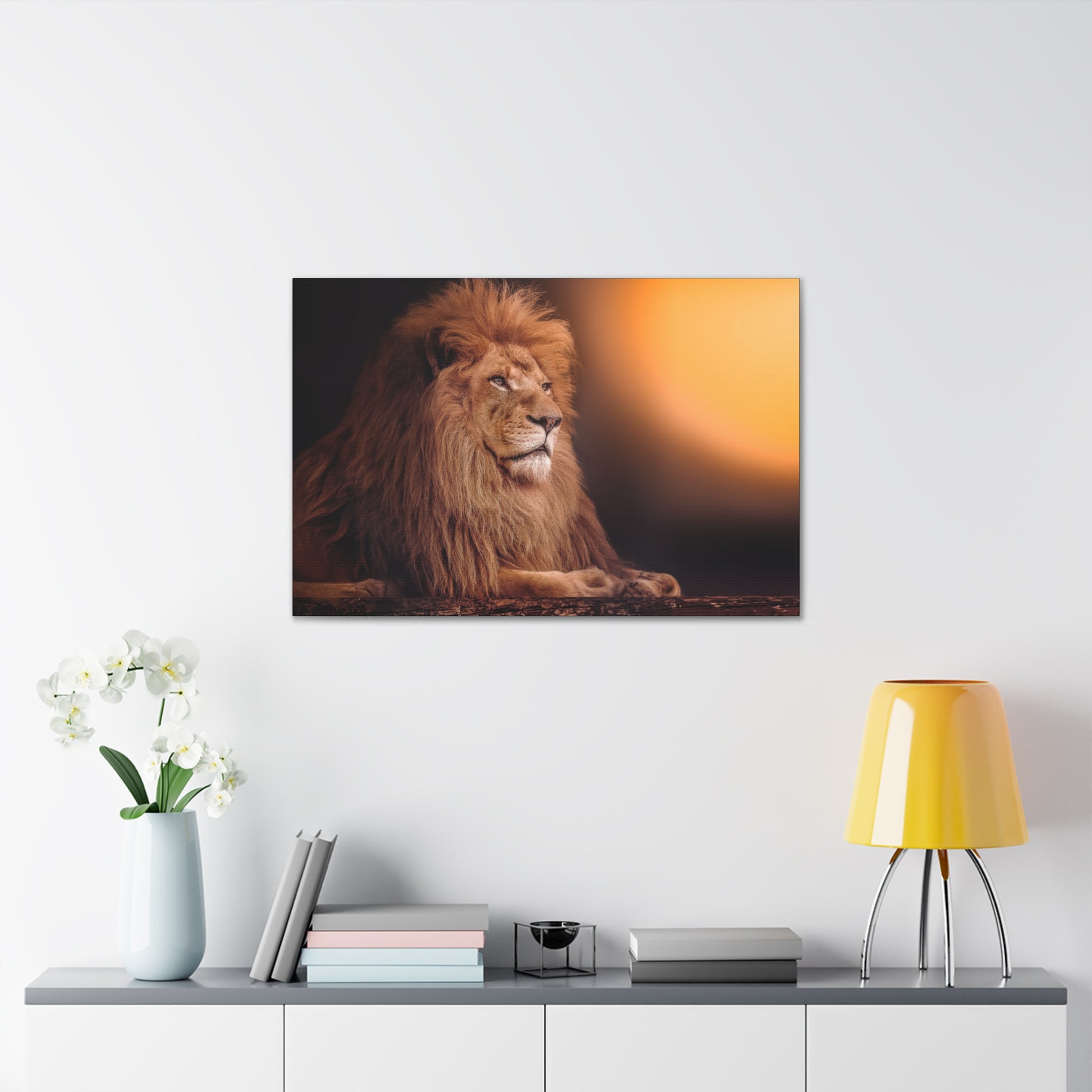 "Golden Majesty – Lion Resting with Sunlit Background Wall Art on canvas, acrylic, and metal – front view featuring a powerful lion against a glowing sun."
