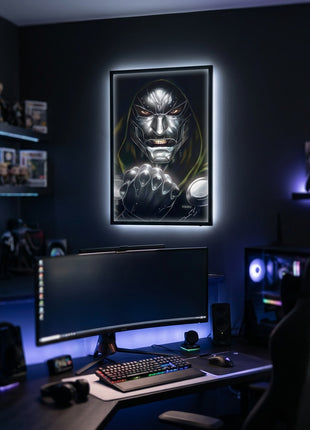 Doctor Doom Iron Tyrant wall art in an illuminated frame above a gaming desk, display mockup