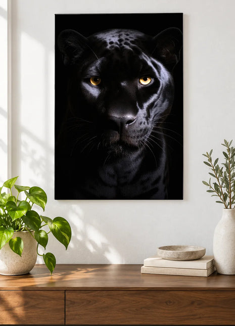Black panther artwork "Shadow with a Stare" shown as a frameless acrylic print above a walnut console against a white wall.
