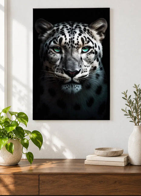 Snow leopard artwork "Mint Condition Cat" shown as a frameless acrylic print above a walnut console against a white wall.