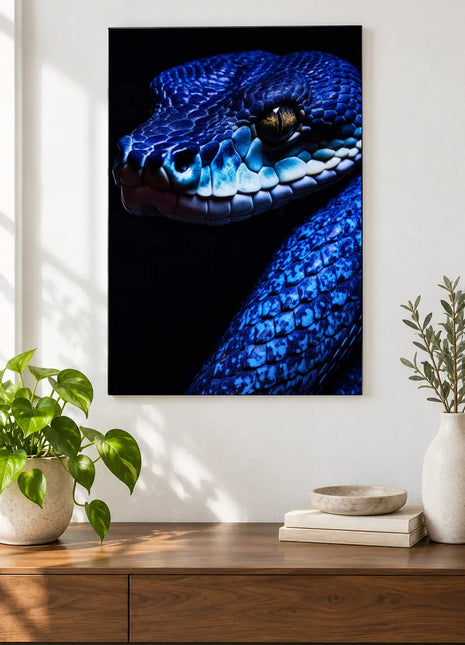 Snake artwork "Blues with Scales" shown as a frameless acrylic print above a walnut console against a white wall.