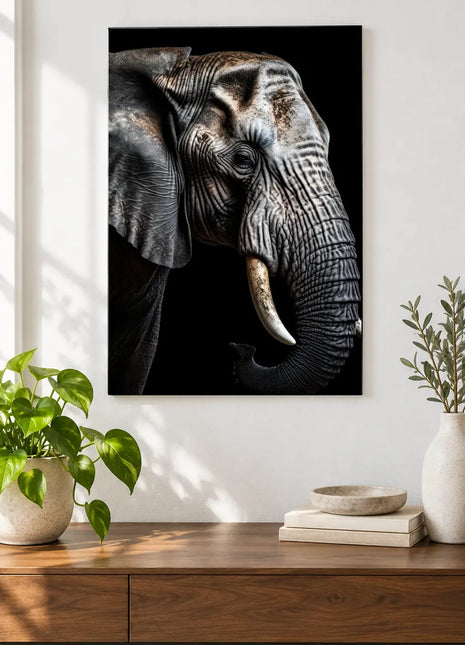 The Tusker's Turn (Elephant), shown as frameless acrylic artwork above a walnut console against a white wall.