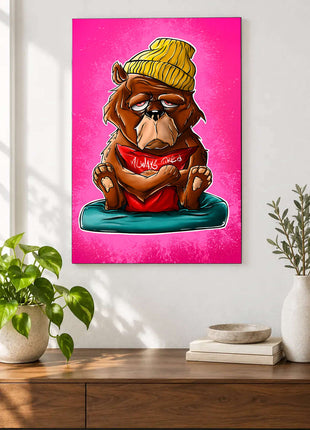 Sleepy cartoon ape in a yellow beanie and Always Tired shirt on a teal cushion displayed above a console table in a room setting