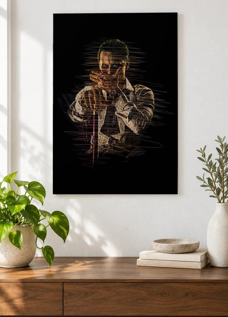 Amber Pause acrylic wall art displayed above a wooden console with plants and books against a white wall.
