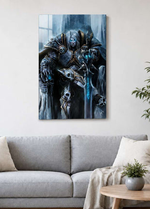 Arthas the Lich King seated on an icy throne with silver hair and a glowing blue rune sword on acrylic wall art above a light gray sofa in a living room with white walls.