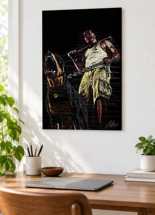 Bat, Chain and Bared Teeth acrylic wall art displayed above a wooden desk with a laptop, plants and books against a white wall.