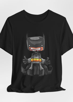 Draped front view of a black graphic T-shirt showing seated chibi Batman with a yellow utility belt.