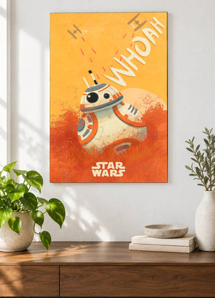 BB-8 Whoa There acrylic wall art displayed above a wooden console with plants and books against a white wall.