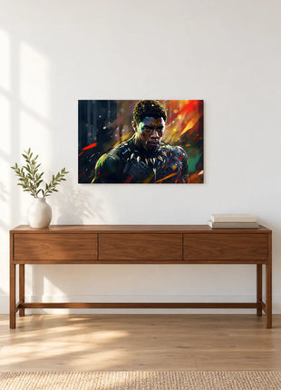 Black Panther Ember Focus acrylic wall art displayed above a wooden console with a leafy vase and stacked books against a white wall.