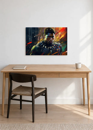 Black Panther Ember Focus acrylic wall art displayed above a wooden desk with a notebook, pencil and white mug against a white wall.