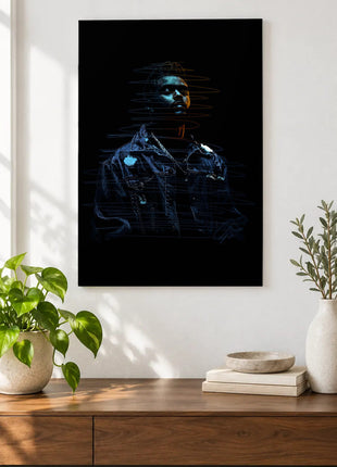 Blue Denim, Amber Edge acrylic wall art displayed above a wooden console with plants and books against a white wall.