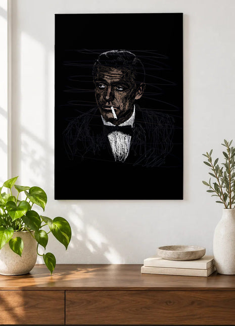 Bow Tie and a Sideways Glance acrylic wall art displayed above a wooden console with plants and books against a white wall.