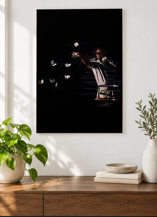 Cash in Midair acrylic wall art displayed above a wooden console with plants and books against a white wall.