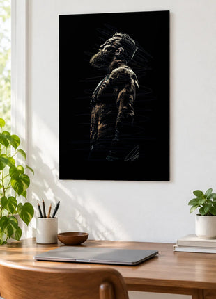Chin to the Light acrylic wall art displayed above a wooden desk with a laptop, plants and books against a white wall.