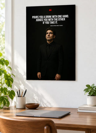 Christopher Moltisanti Double Standards acrylic wall art displayed above a wooden desk with a laptop, plants and books against a white wall.