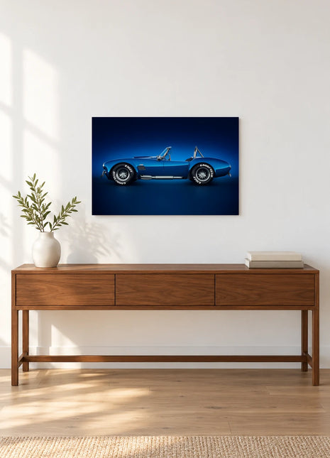 Cobalt Afterglow car wall art displayed above a walnut console against a white wall