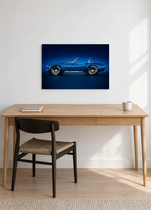 Cobalt Afterglow car wall art displayed above a wooden desk against a white wall