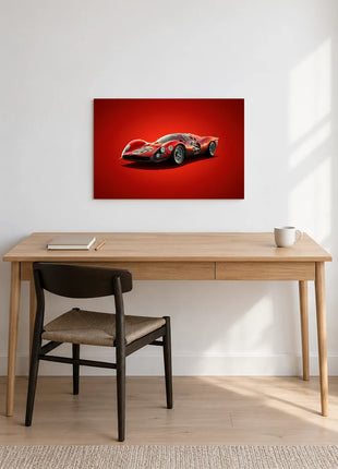 Crimson Endurance Twenty-Six car wall art displayed above a wooden desk against a white wall