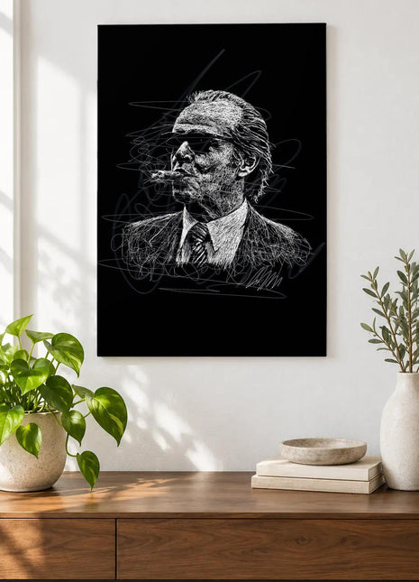 Dark Glasses, White Collar acrylic wall art displayed above a wooden console with plants and books against a white wall.