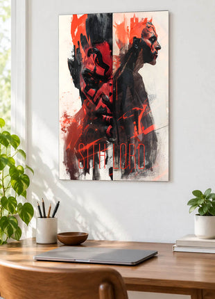 Darth Vader and Darth Maul Divided Darkness acrylic wall art displayed above a wooden desk with a laptop, plants and books against a white wall.