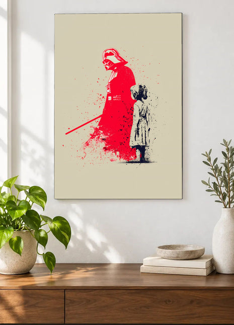 Darth Vader and Leia A Divided Bond acrylic wall art displayed above a wooden console with plants and books against a white wall.