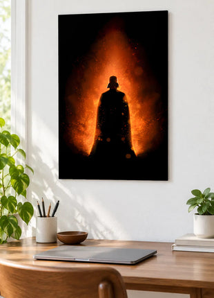 Darth Vader Cinder Watch acrylic wall art displayed above a wooden desk with a laptop, plants and books against a white wall.