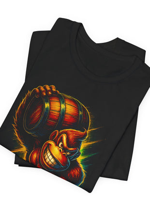 Folded black T-shirt detail showing Donkey Kong’s grinning face and the wooden barrel with dark bands.