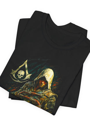 Folded black T-shirt detail of Edward Kenway’s ivory hood, the skull crest and two pistols across his chest.