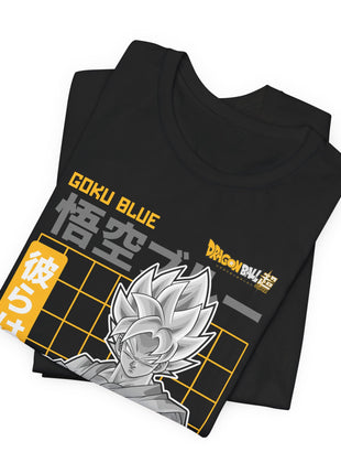 Folded black Goku Grayscale Gold Grid Graphic T-Shirt showing a close view of the printed character artwork.