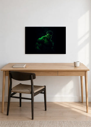 Hulk Emerald After Dark acrylic wall art displayed above a wooden desk with a notebook, pencil and white mug against a white wall.