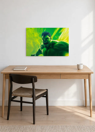 Hulk Gamma Sunburst acrylic wall art displayed above a wooden desk with a notebook, pencil and white mug against a white wall.