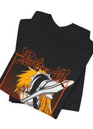 Folded black Ichigo Split Mask Orange Panel Graphic T-Shirt showing a close view of the front artwork.