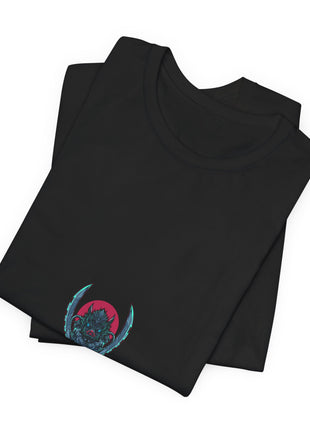 Folded black Inosuke Beast Breathing Small Emblem Graphic T-Shirt showing a close view of the printed character artwork.