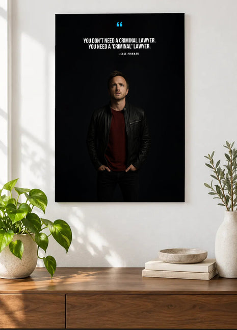 Jesse Pinkman A Different Kind of Lawyer acrylic wall art displayed above a wooden console with plants and books against a white wall.