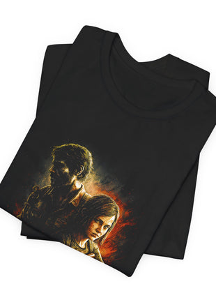Folded view of the black Joel and Ellie Survivor Portrait Graphic T-Shirt.