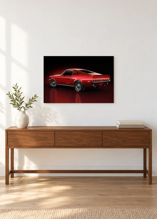 Last Light Fastback shown as horizontal acrylic wall art above a wooden console with a vase of leafy stems and stacked books.