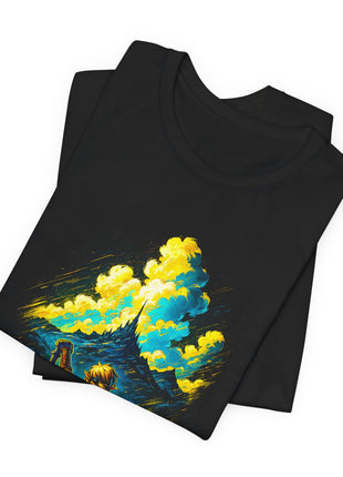 Folded black T-shirt detail showing golden clouds, blue mountains and the distant castle above Link.