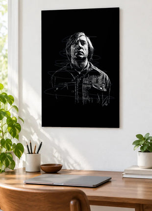 Loose Hair Dark Denim acrylic wall art displayed above a wooden desk with a laptop, plants and books against a white wall.
