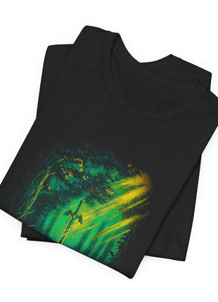 Folded black T-shirt detail showing the Master Sword’s winged hilt, green canopy and diagonal golden light.
