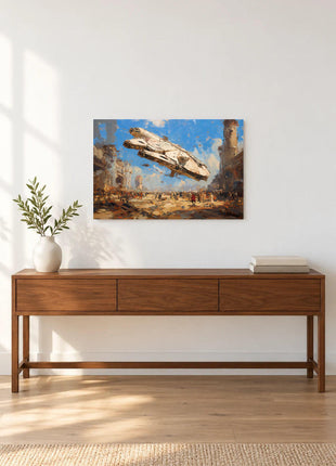 Millennium Falcon Dustbound Arrival acrylic wall art displayed above a wooden console with a leafy vase and stacked books against a white wall.