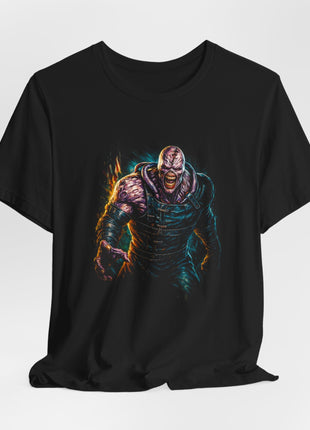 Gathered black T-shirt front with Nemesis’s reaching hand, dark strapped coat and pink-purple scarred face.
