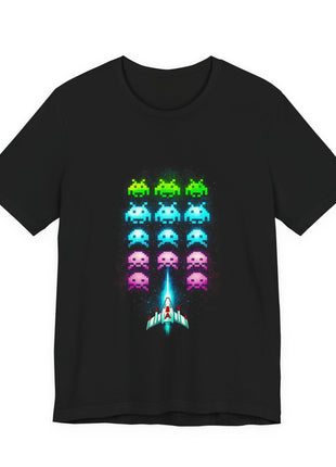 Black T-shirt front with green, cyan and pink pixel invaders above a white-and-cyan spacecraft.