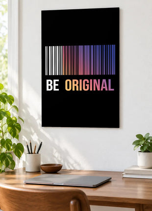 Original by Design acrylic wall art displayed above a wooden desk with a laptop, plants and books against a white wall.