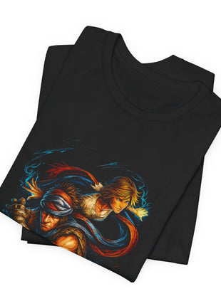 Folded black T-shirt close-up showing Elika above the Prince’s wrapped head and armored glove, surrounded by red-blue fabric and blue trails.