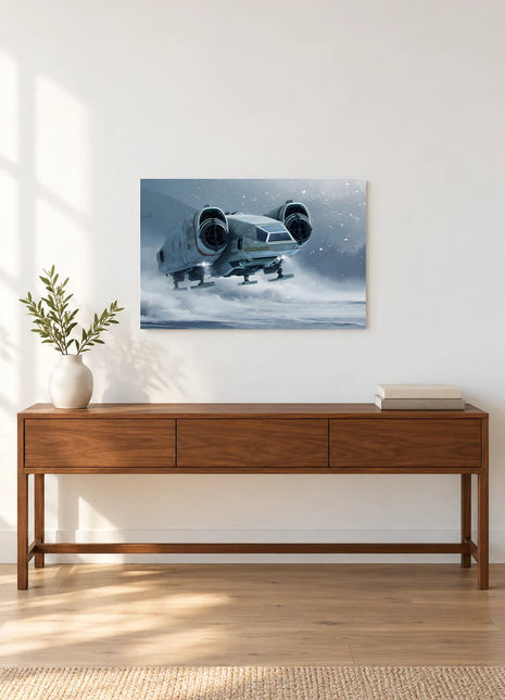 Razor Crest Through the Snow acrylic wall art displayed above a wooden console with a leafy vase and stacked books against a white wall.